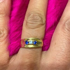 10k gold ring with saphire and aquamarine birthstone. Size 5 approximately